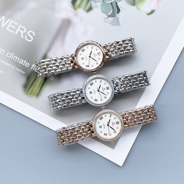 白光 金 钻30 升级版OMEGA -欧米茄典雅系列 卓越的惊艳亮相，将华贵珠宝的优雅魅力与卓越时计的精准技术完美结合“露珠”连结成一条光华夺目的表链，流畅的线