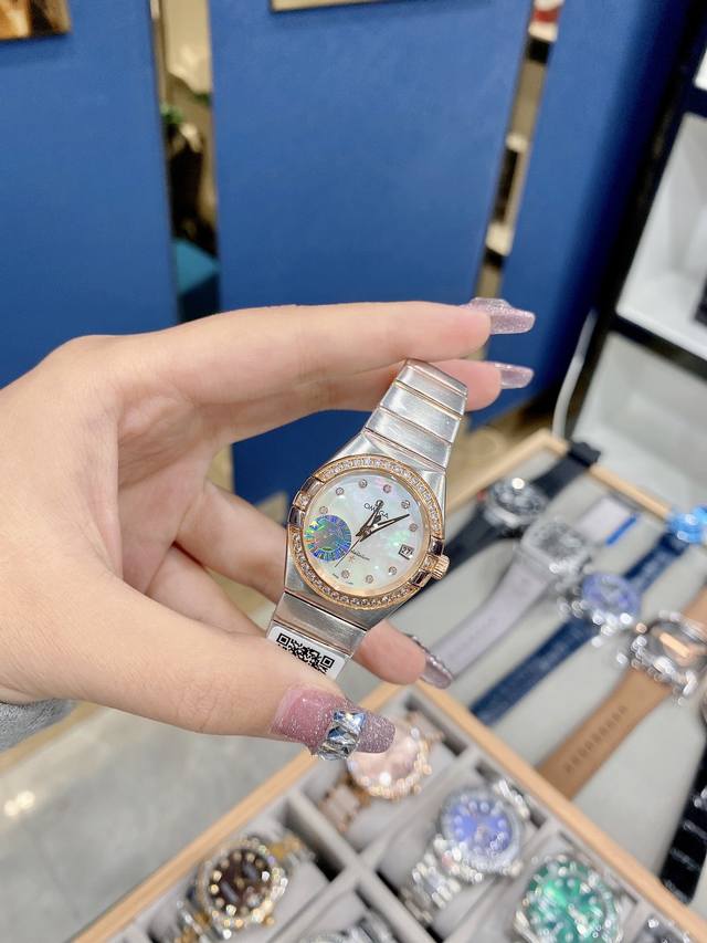 欧米茄星座系列 女款高质量精钢 间玫瑰金表带 石英进口机芯蓝宝石镜面直径： 27Mm 全套包装30